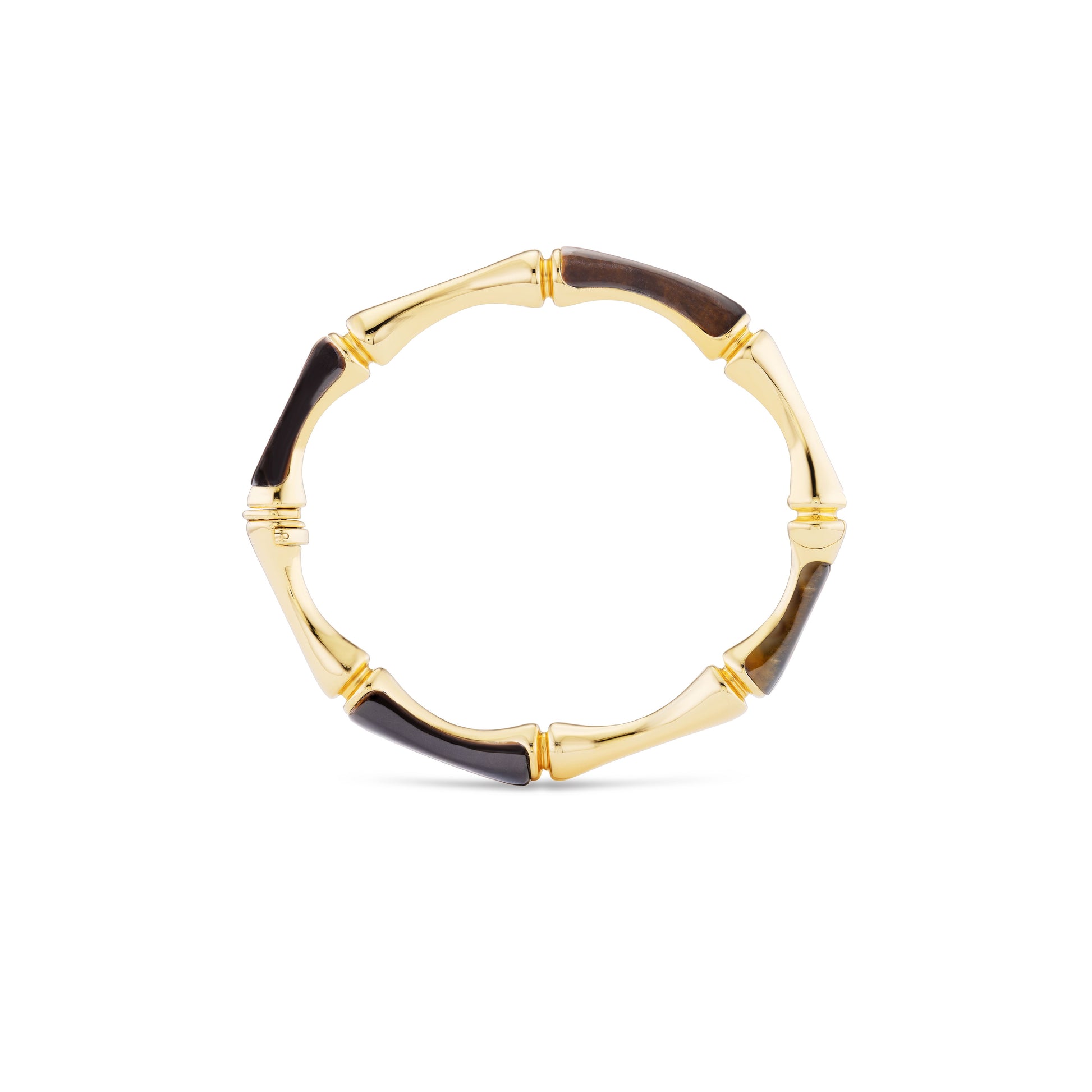 Gold bracelet with brown accents on a white background