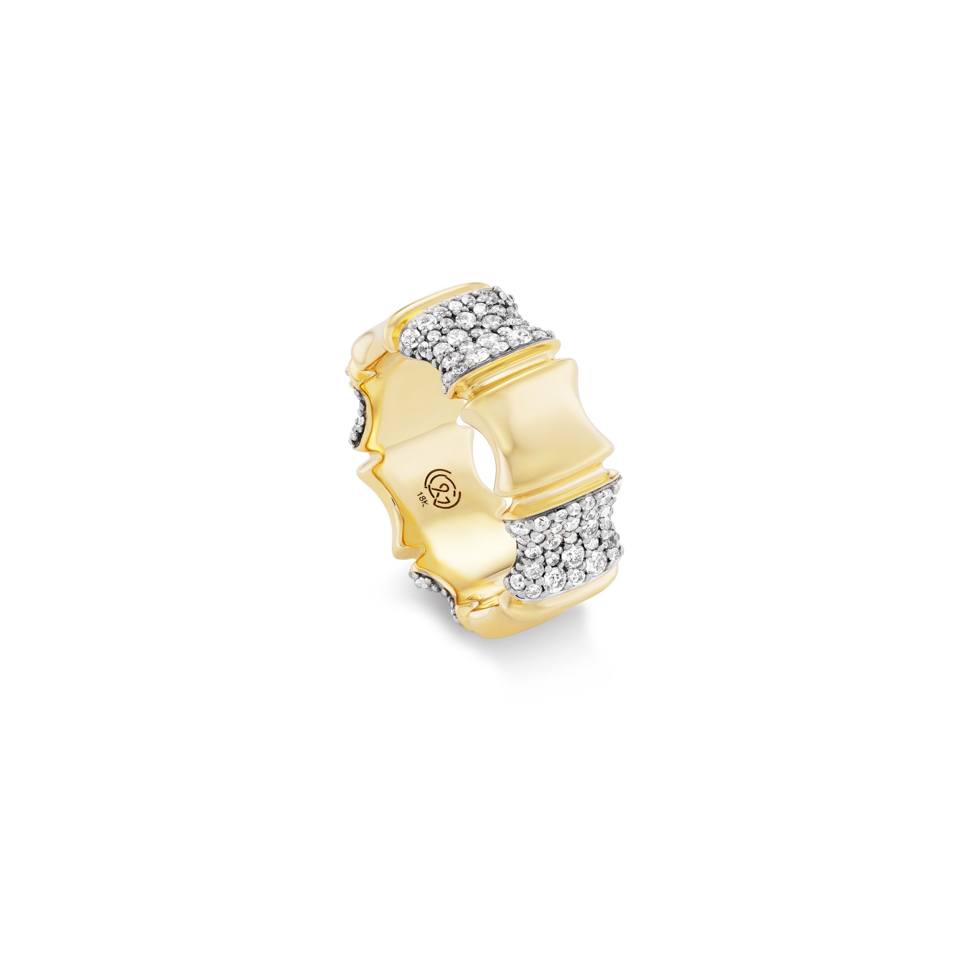 Gold ring with embedded diamonds on a white background