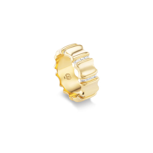 Gold ring with embedded diamonds on a white background