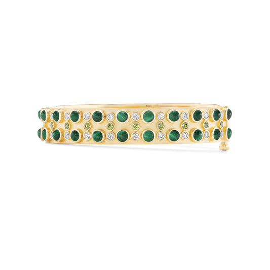 Gold bangle bracelet with green Malachite gemstones on a white background
