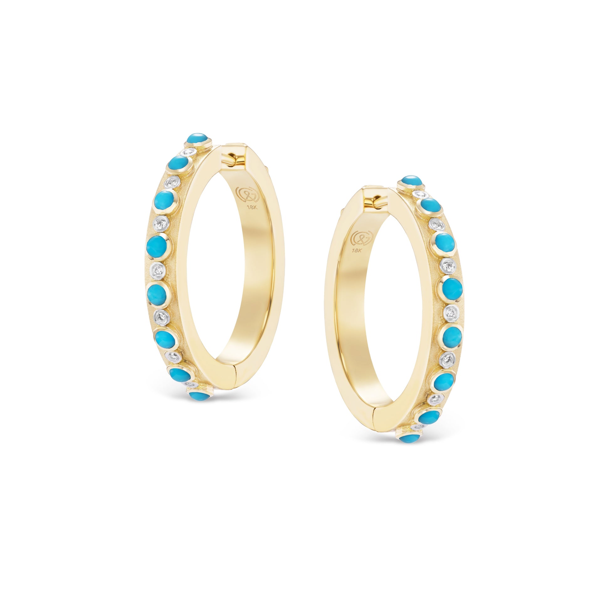 Gold hoop earrings with turquoise stones on a white background