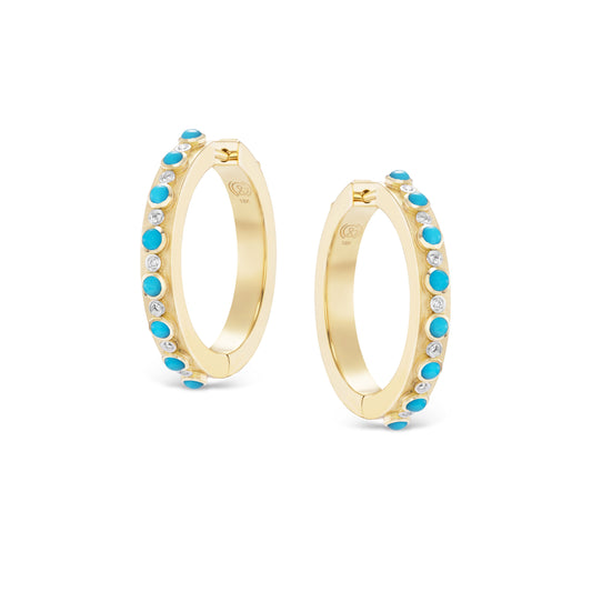 Gold hoop earrings with turquoise stones on a white background