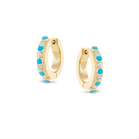 Gold hoop earrings with turquoise stones on a white background