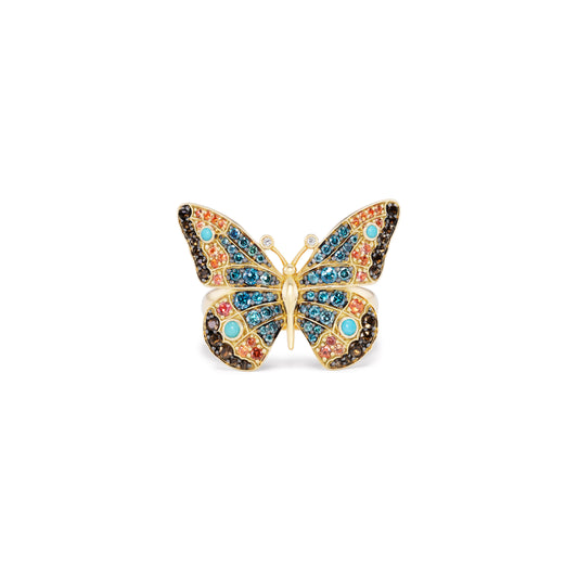 An 18k yellow gold ring in the shape of a butterfly, featuring blue and pink diamonds, orange sapphires, smoky quartz, white diamonds, and carved turquoise.