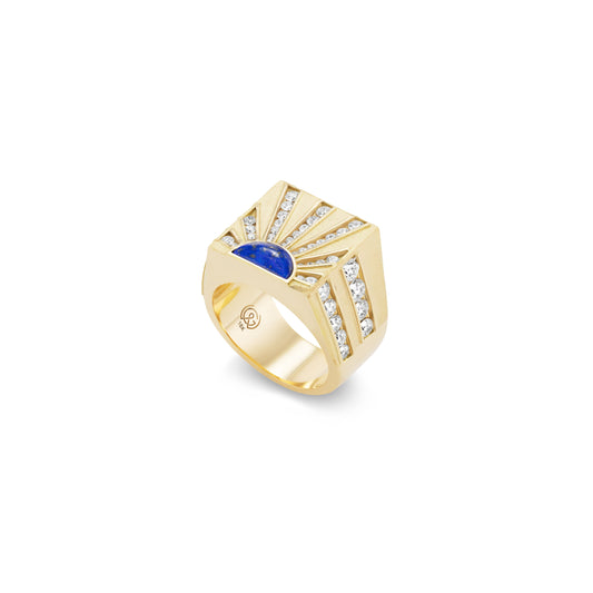 Gold ring with a blue Lapis gemstone and diamonds on a white background