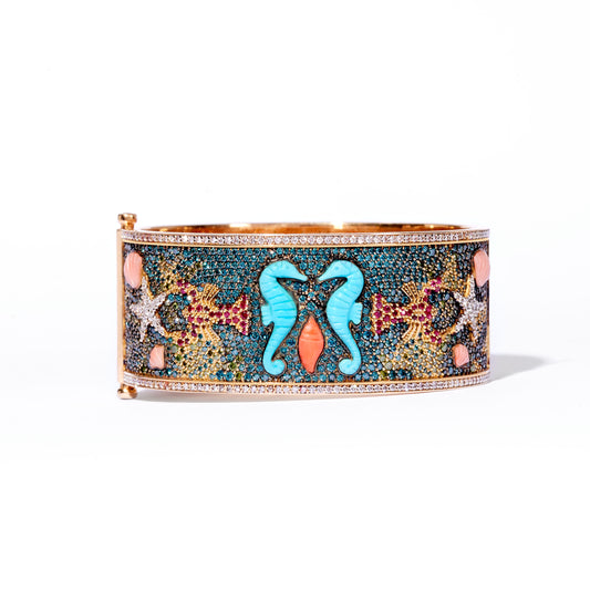 Mates For Life Bracelet by Grace Winfrey symbolizing enduring partnerships. Includes carved stone seahorses and other sea life.