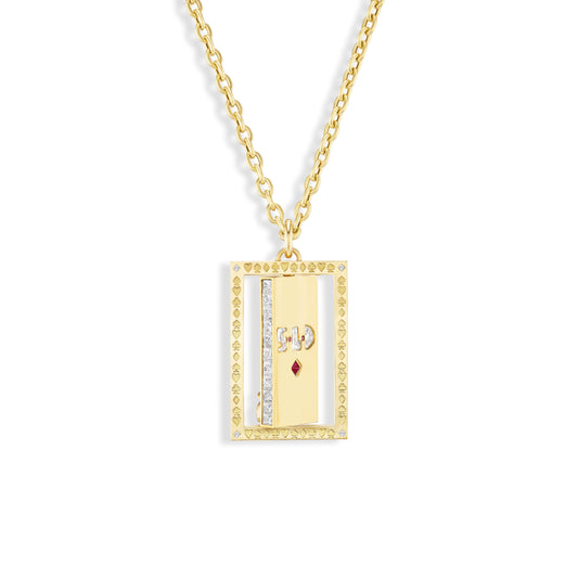 Gold necklace with a rectangular pendant featuring a heart and diamond design on a white background