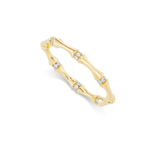 Gold bracelet with diamond accents on a white background
