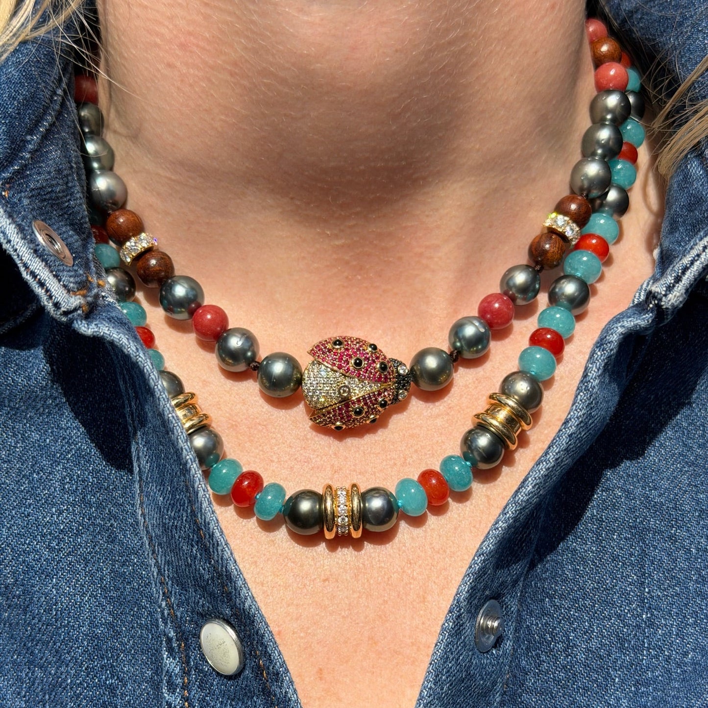 Woman wearing beaded necklaces.