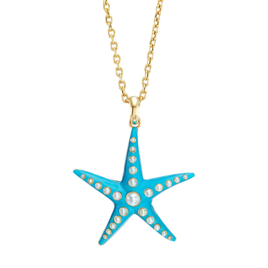 Teal starfish shaped pendant with imbedded pearls on a gold chain necklace
