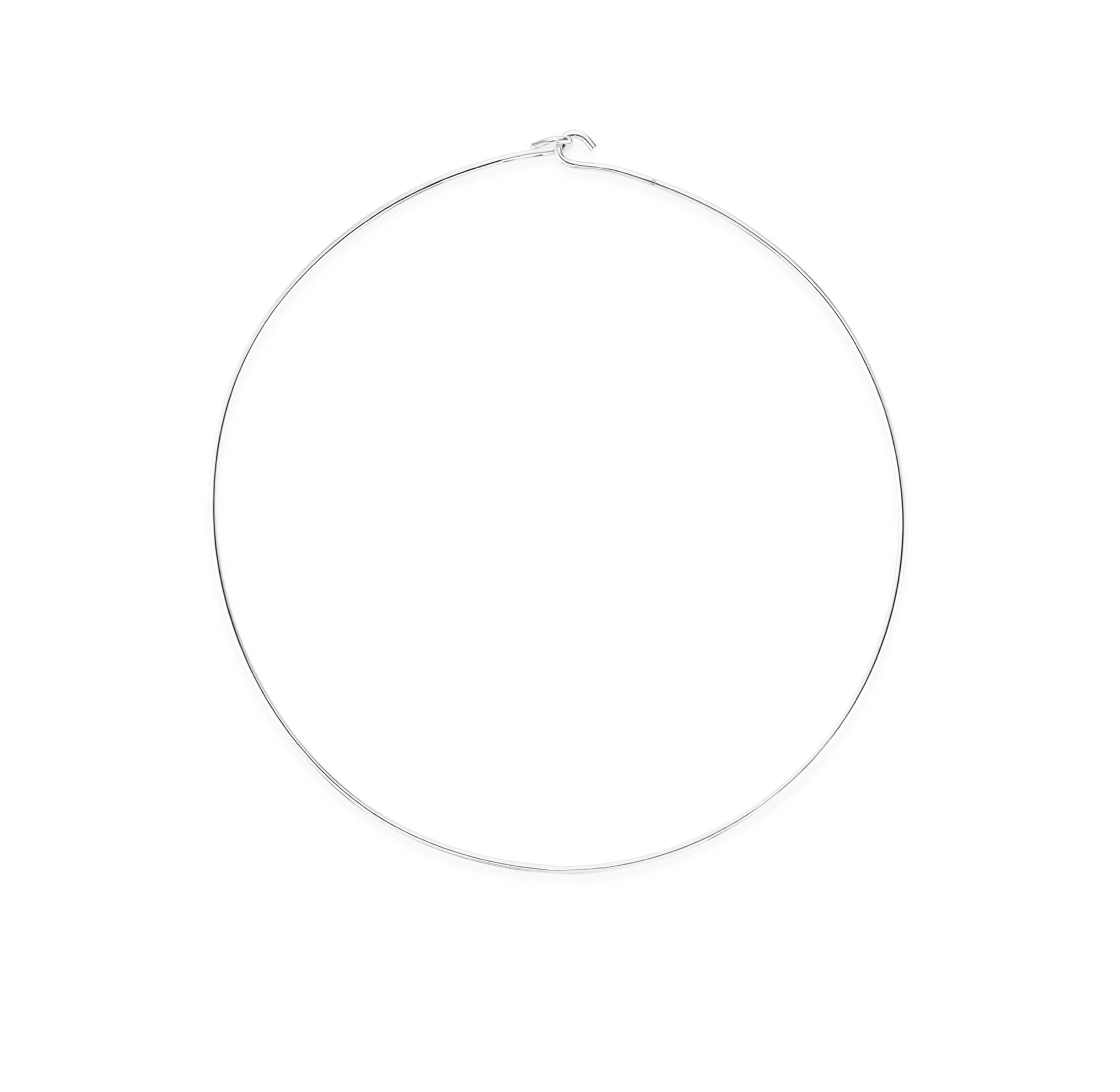 Thin silver necklace on a white background