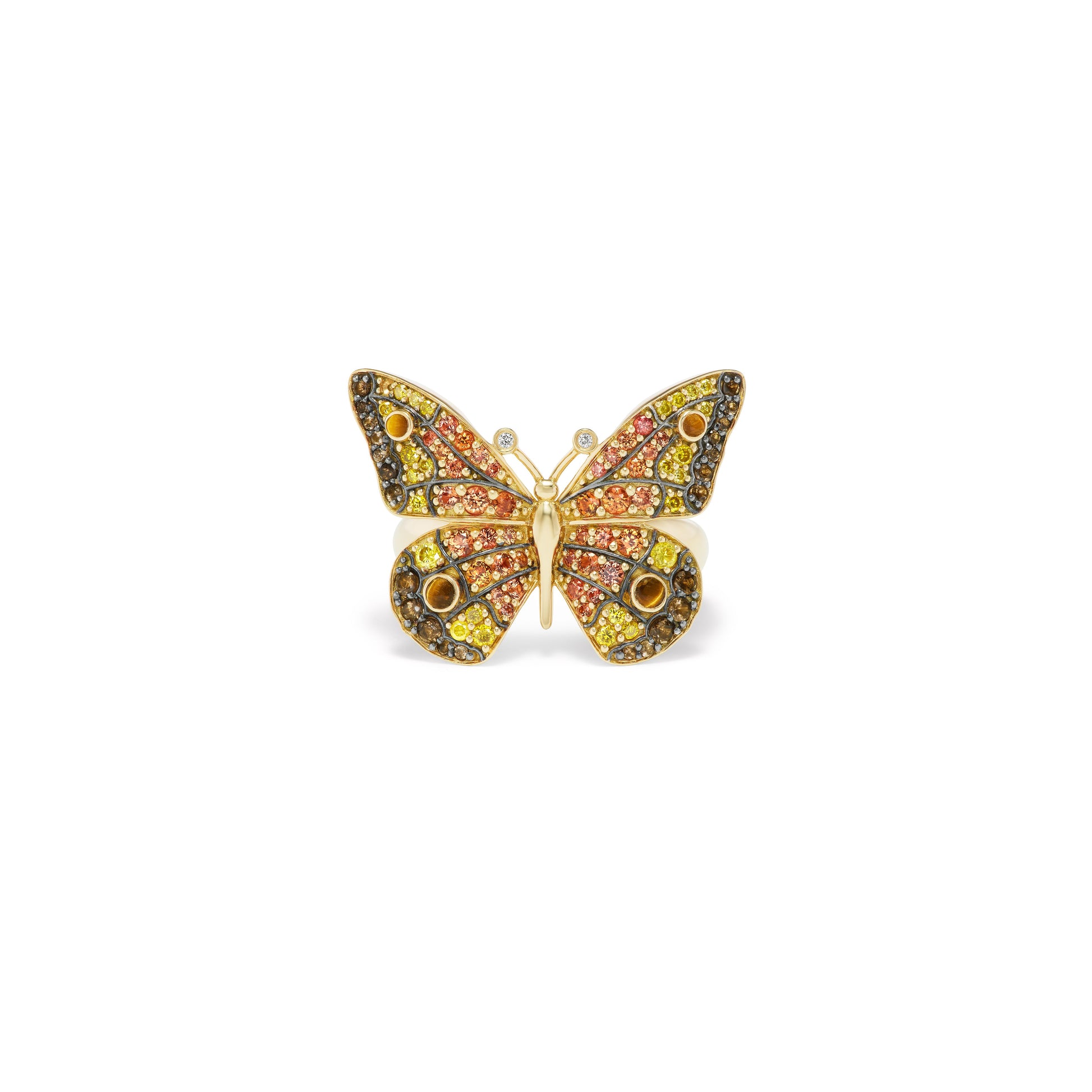 Butterfly-shaped jewelry piece with colorful stones on a white background