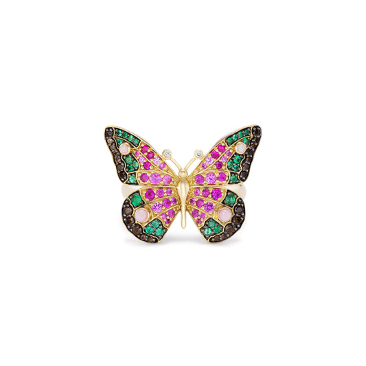 An 18k yellow gold ring in the shape of a butterfly, featuring blue and pink diamonds, orange sapphires, smoky quartz, white diamonds, and carved turquoise.