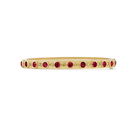 Gold bangle with rubies and yellow diamonds