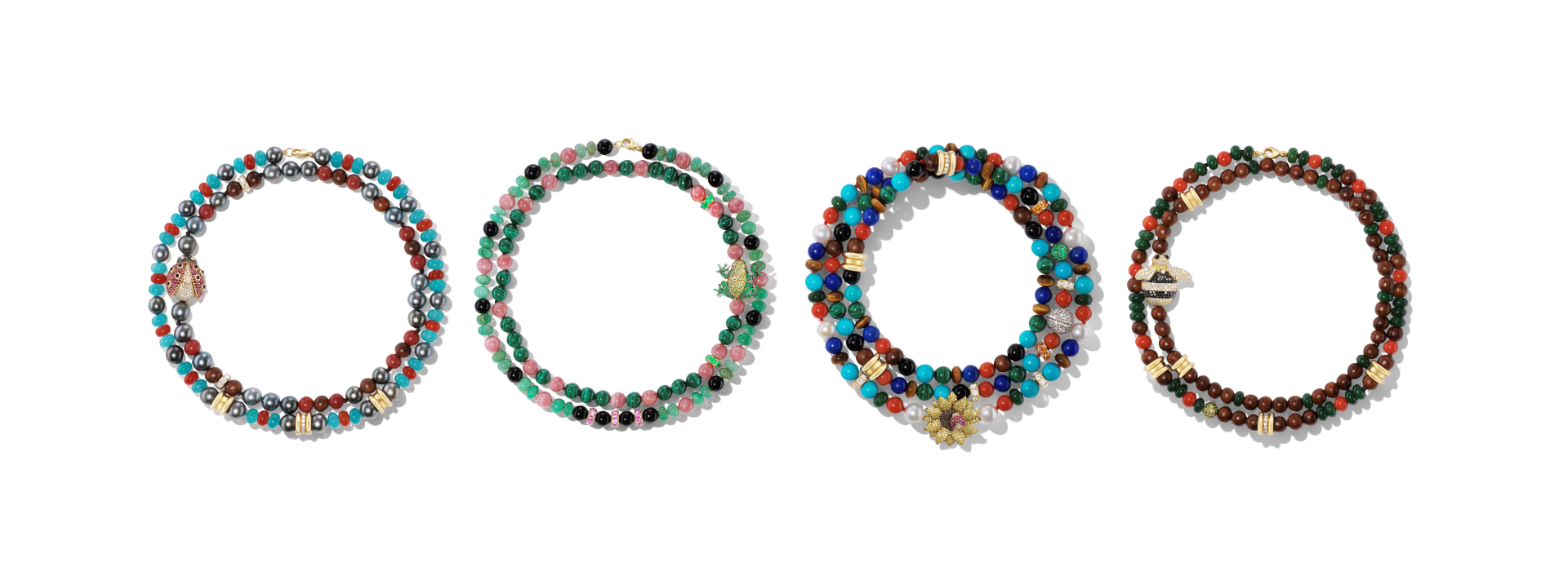 Set of four multicolored beaded hoop earrings on a white background