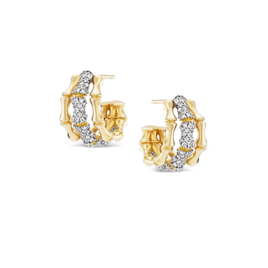 Gold hoop earrings with diamond accents on a white background