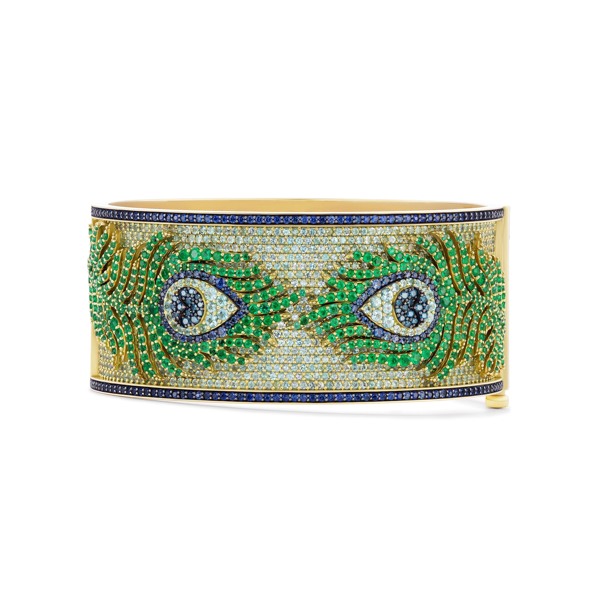 Decorative bracelet with peacock feather design on a white background