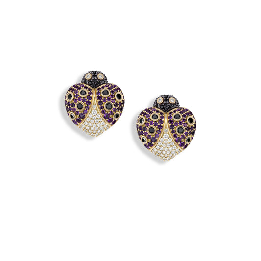 Heart-shaped earrings with purple and gold design on a white background
