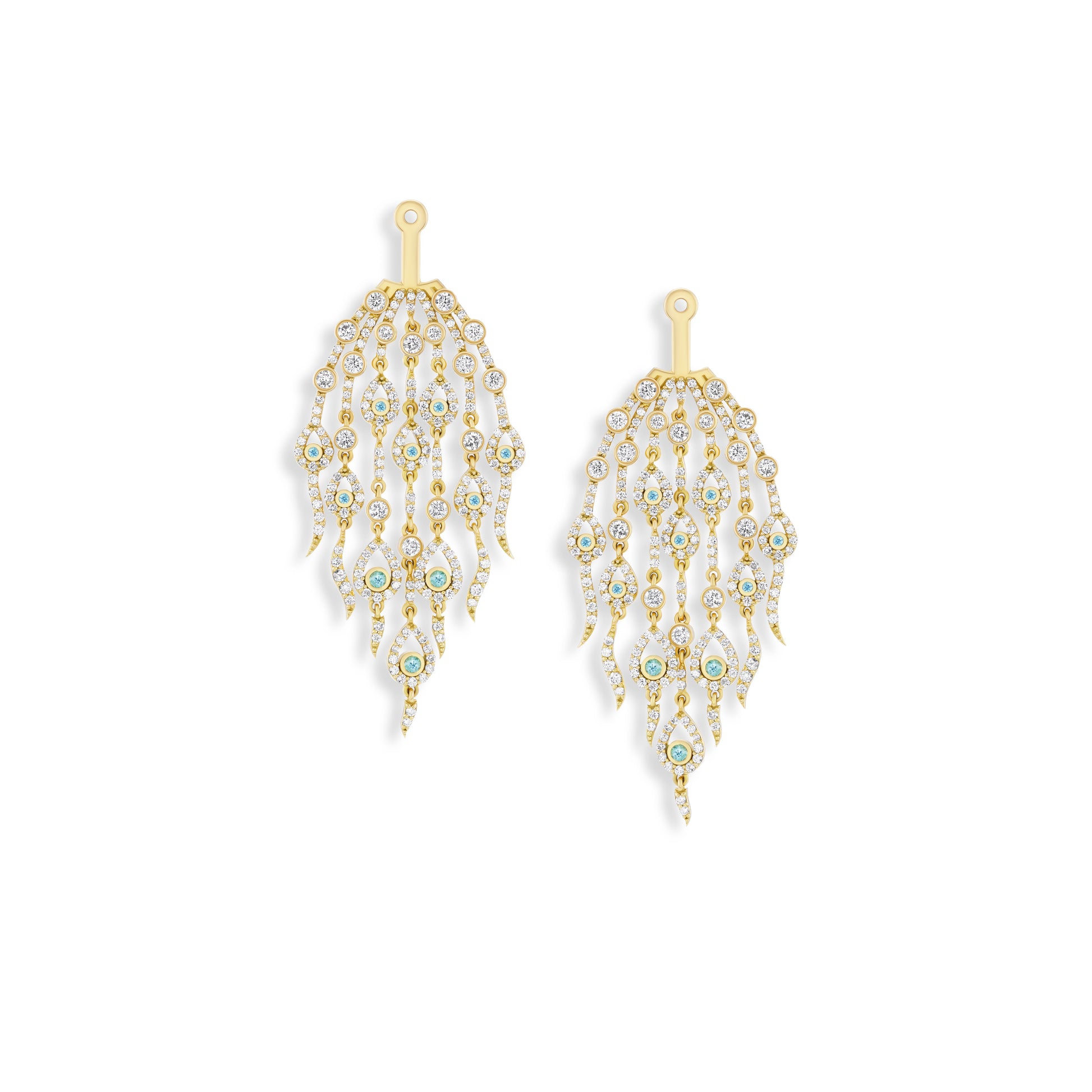 Gold and pearl earrings on a white background