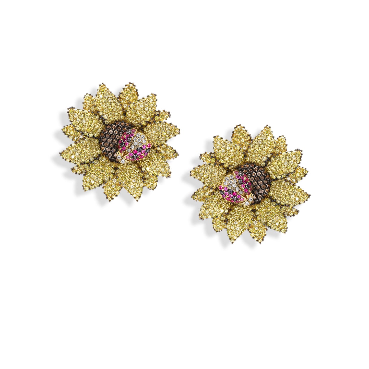 Gold sunflower-shaped earrings with gemstones on a white background