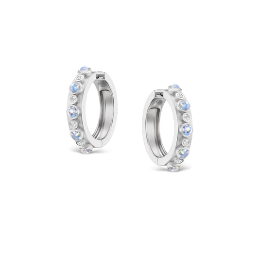 Pair of silver hoop earrings with small stones on a white background