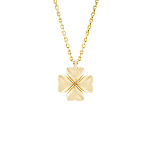 Gold four-leaf clover pendant on a chain against a white background