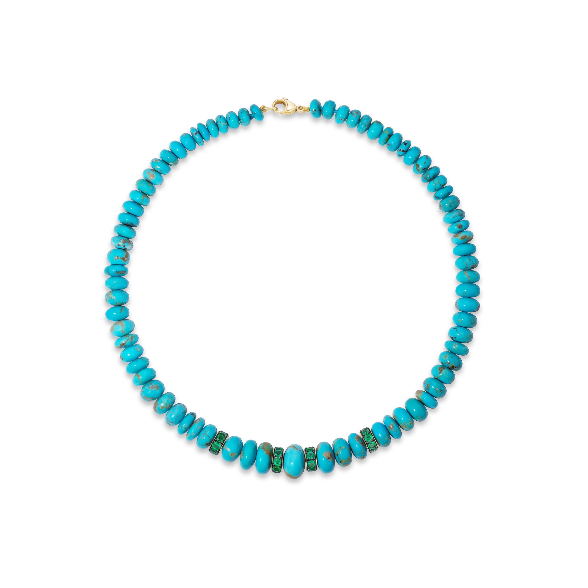Turquoise beaded necklace with emeralds.
