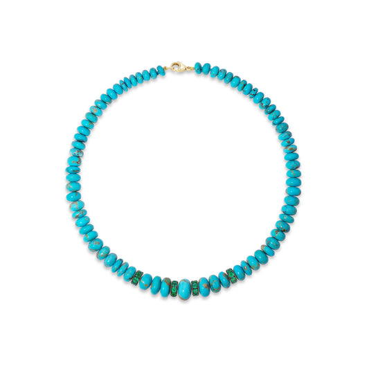 Turquoise beaded necklace with emeralds.