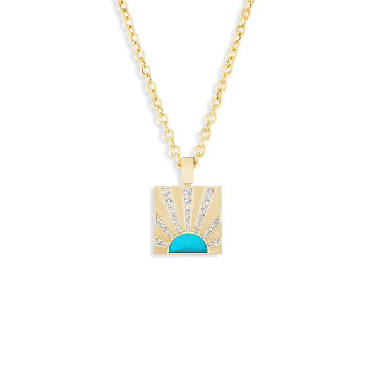 Gold necklace with a square pendant featuring a turquoise stone on a white background