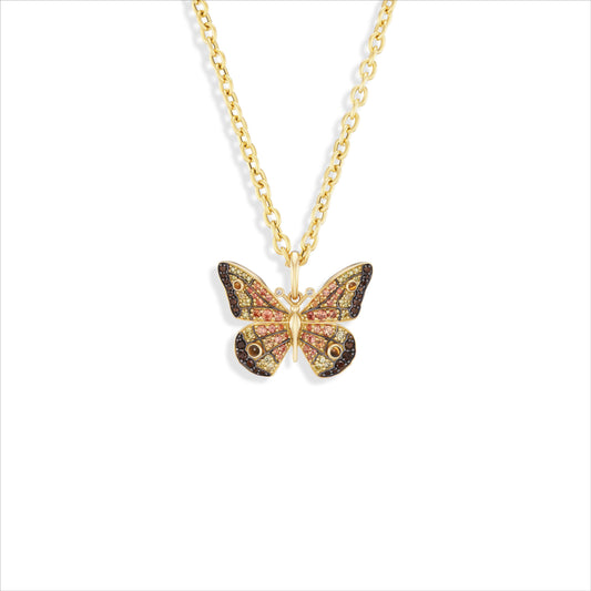 A gold butterfly pendant necklace on a delicate gold chain, featuring intricate multicolor enamel detailing on the wings, set against a clean white background.