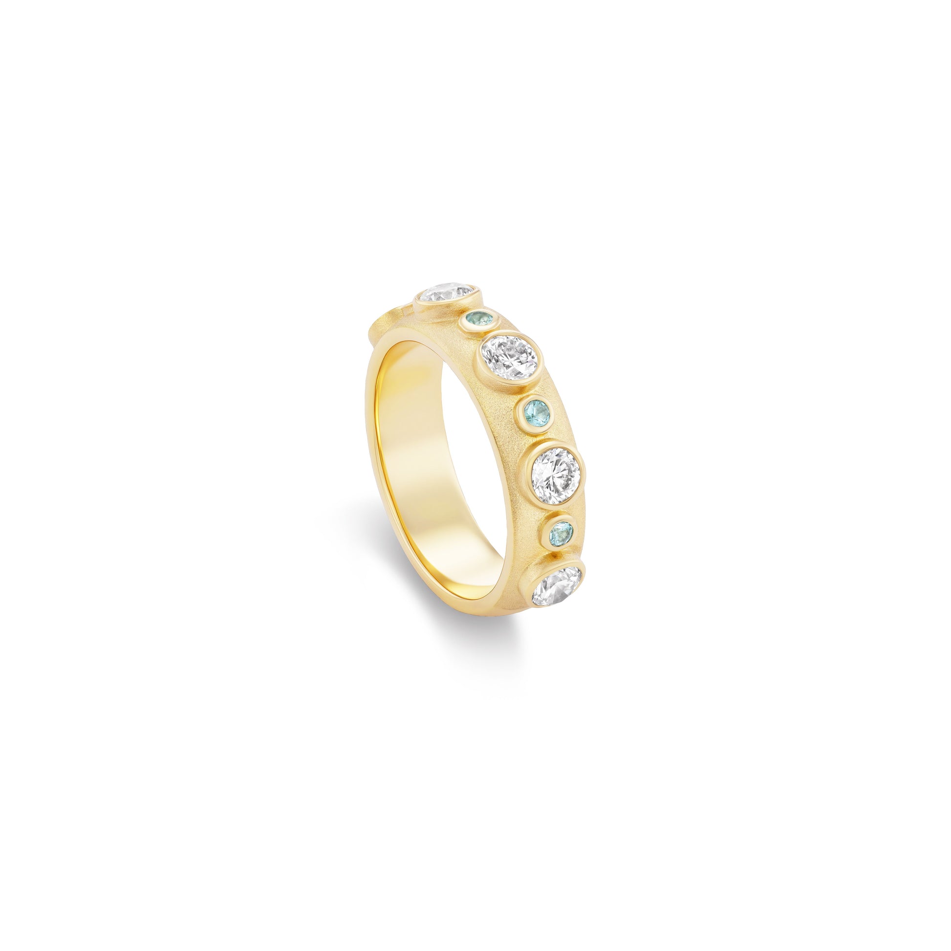 Gold ring with embedded gemstones on a white background