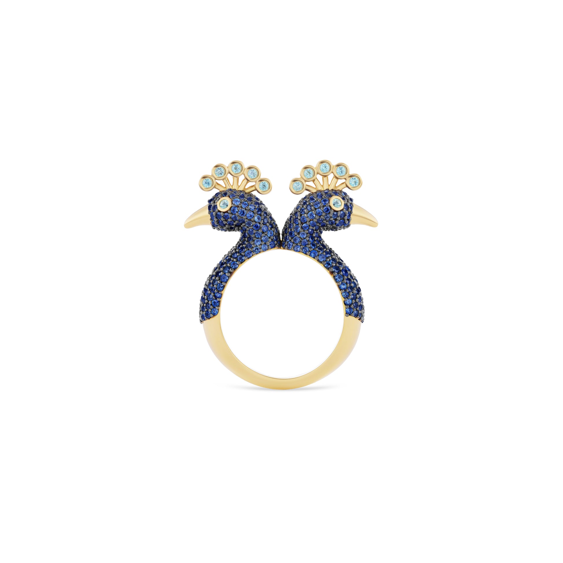 Gold ring with blue gemstone peacock designs on a white background